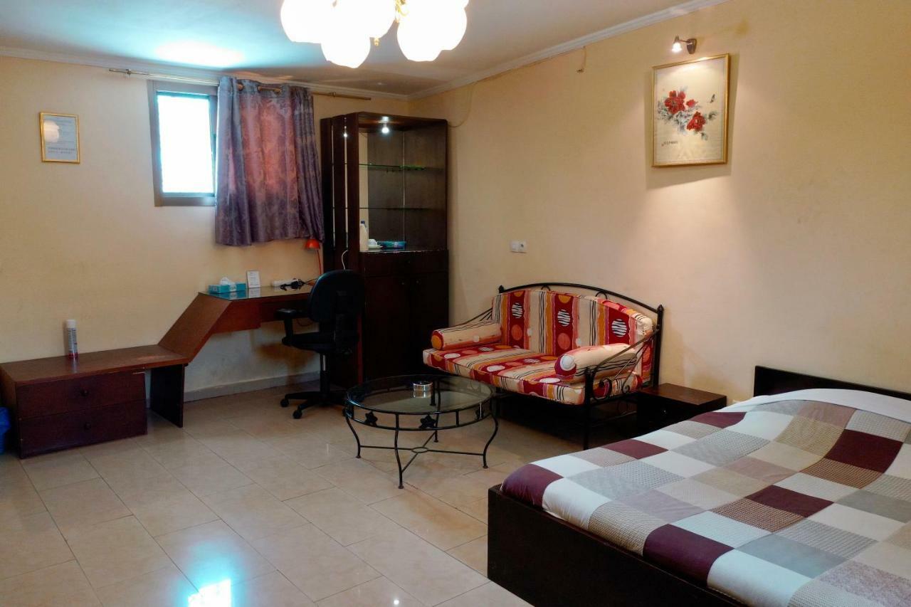 Petit Motel Beijing Abidjan Exterior foto
